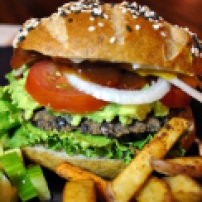 Black Bean Veggie Burger: https://vedgedout.com/2012/10/01/black-bean-veggie-burger-with-guac-on-a-pretzel-bun/